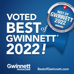 A blue banner with the words " voted best of gwinnett 2 0 2 2 !"